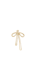 Gold bow-shaped hairpin on a white background