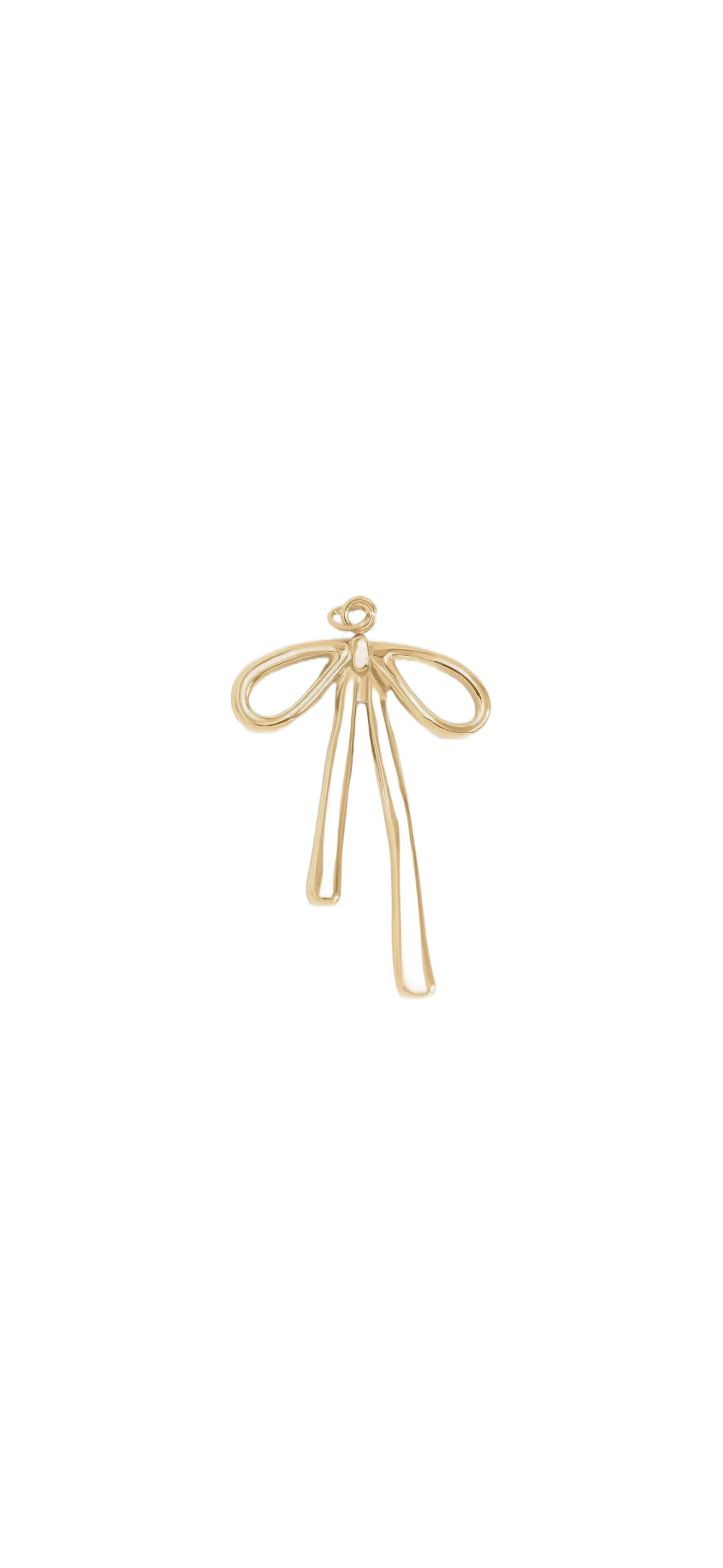Gold bow-shaped hairpin on a white background